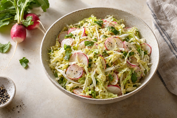 Crunchy Napa cabbage and French breakfast radish slaw with cider-Dijon dressing