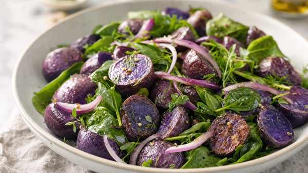 Warm Purple Majesty Potato and Spinach Salad