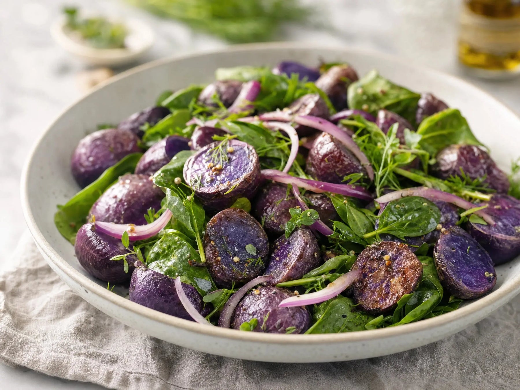Warm Purple Majesty Potato and Spinach Salad