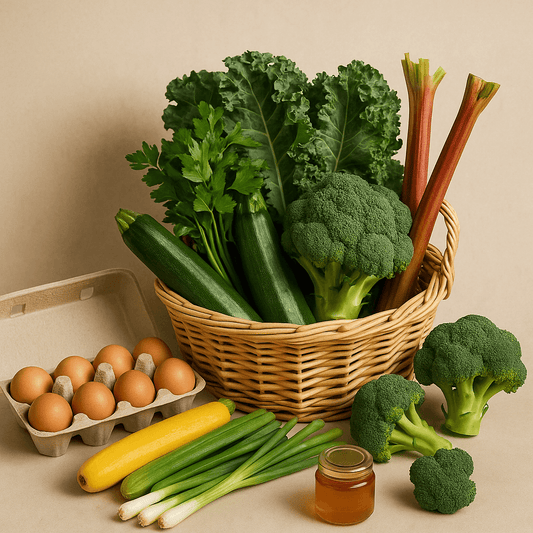 Fresh seasonal vegetables and pasture-raised eggs in a basket, perfect for healthy cooking and meal prep.