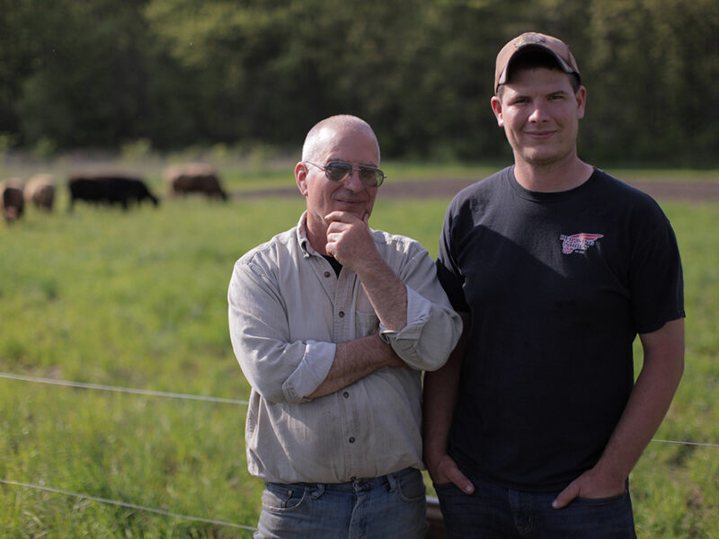 Marty and Will Travis on the farm